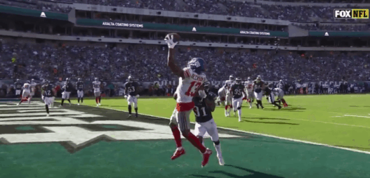 Odell Beckham Jr. claque un touchdown à une main et célèbre le poing levé