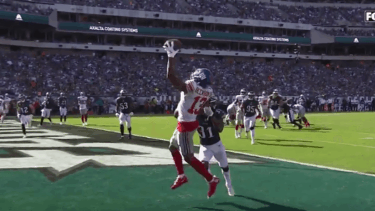 Odell Beckham Jr. claque un touchdown à une main et célèbre le poing levé