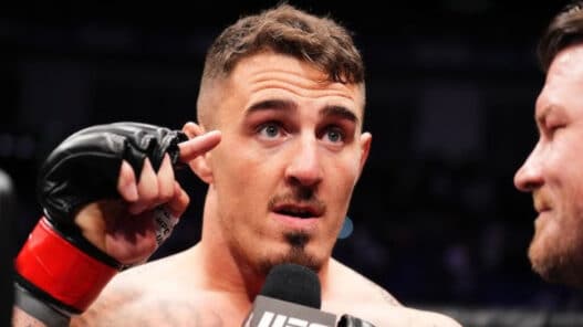 tom aspinall critique